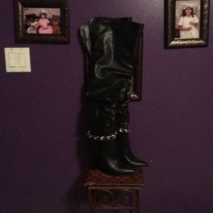 Thigh high boots with gold chain